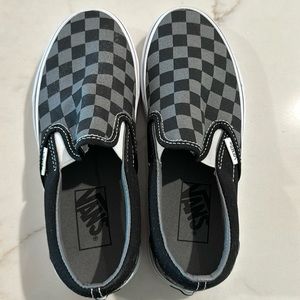 Black and gray checkered Vans
